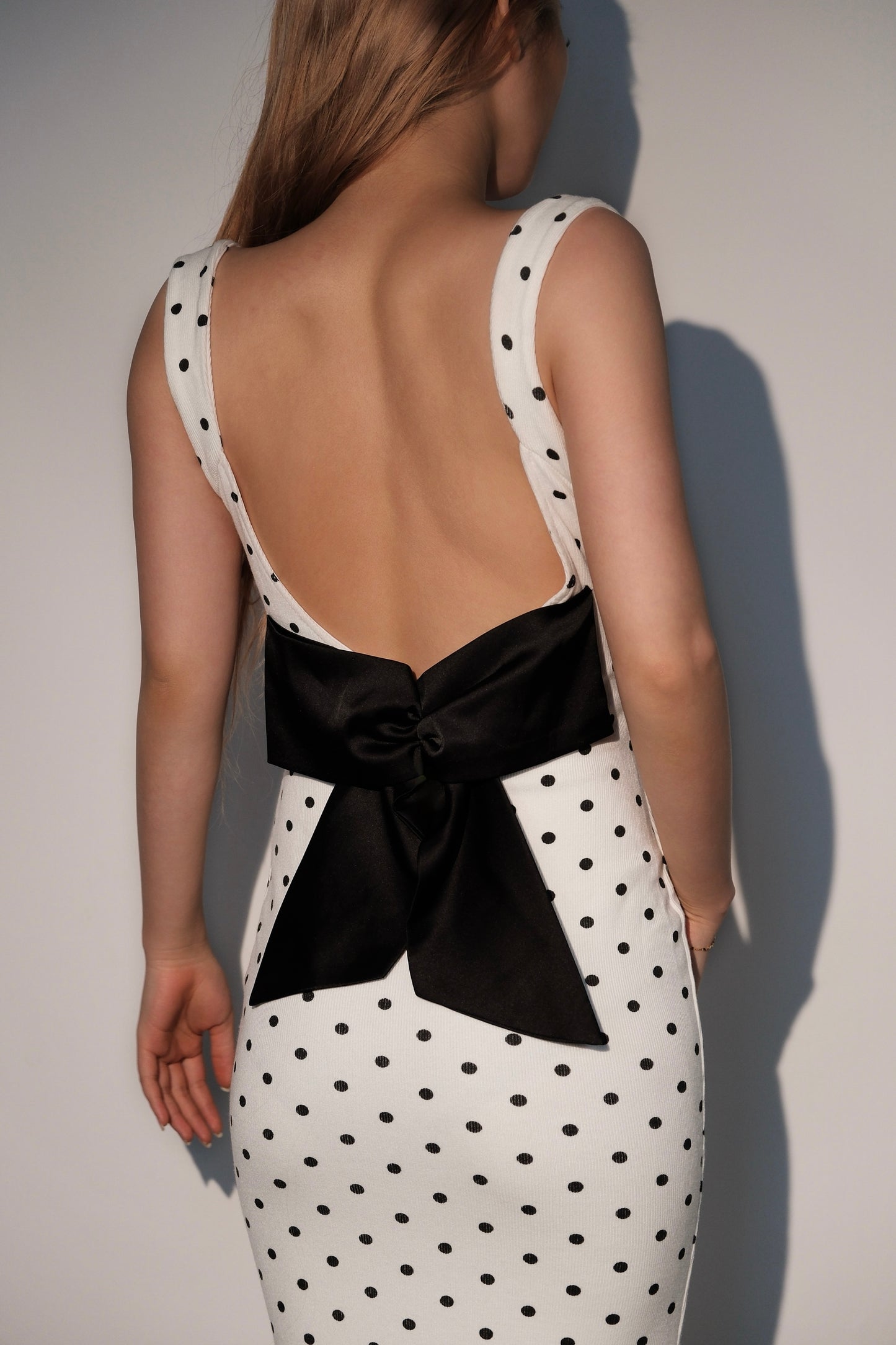 Bow-back black polka dot maxi dress